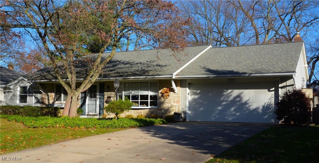 ranch-style home with a garage