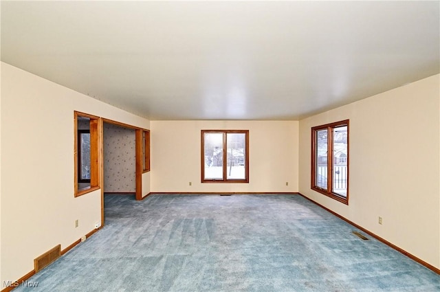 unfurnished room with carpet