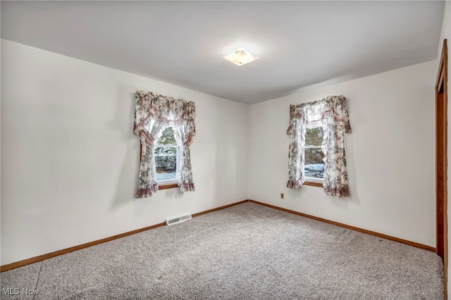 view of carpeted spare room