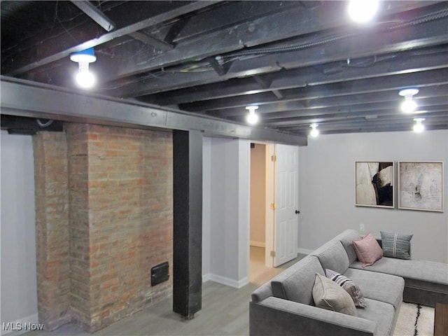 basement featuring wood-type flooring