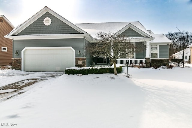 craftsman-style house featuring a garage and a porch