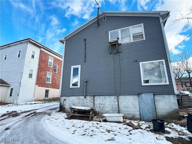 view of snow covered property