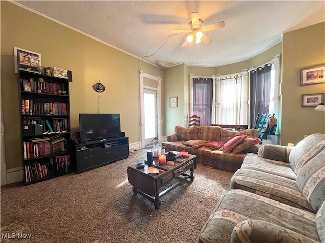 carpeted living room featuring ceiling fan, ornamental molding, and a textured ceiling