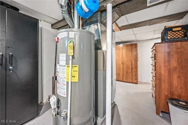 utility room with water heater