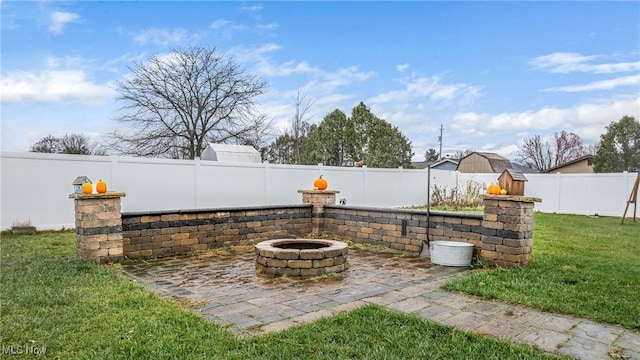 view of patio / terrace featuring a fire pit