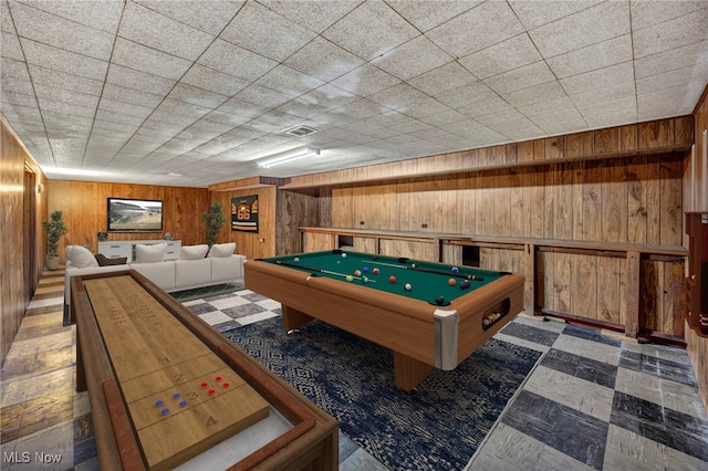 rec room featuring pool table and wooden walls