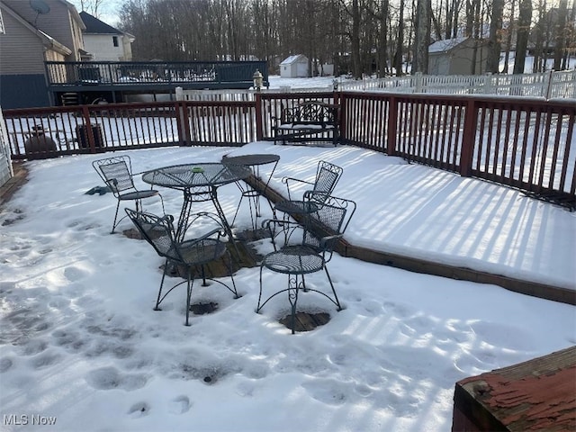 view of snow covered deck