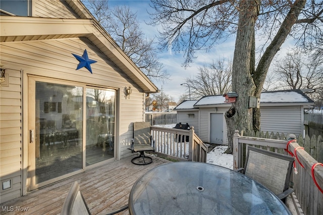 deck with a storage shed