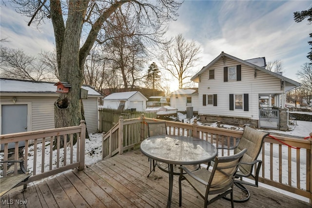 view of snow covered deck