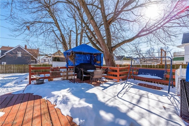 view of snow covered deck