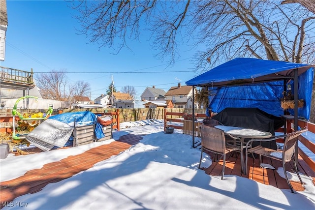 view of yard covered in snow