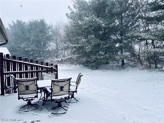 view of snow covered deck