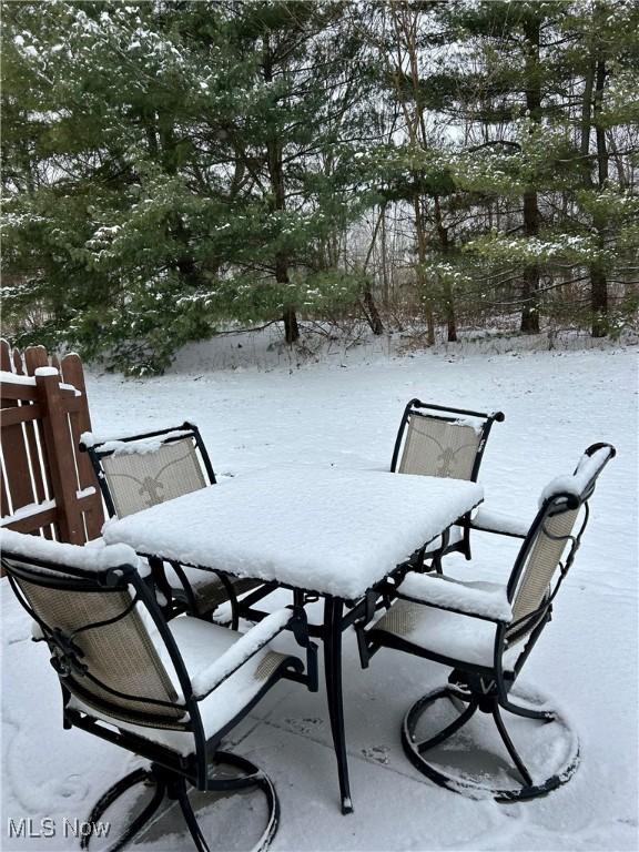 view of snow covered patio