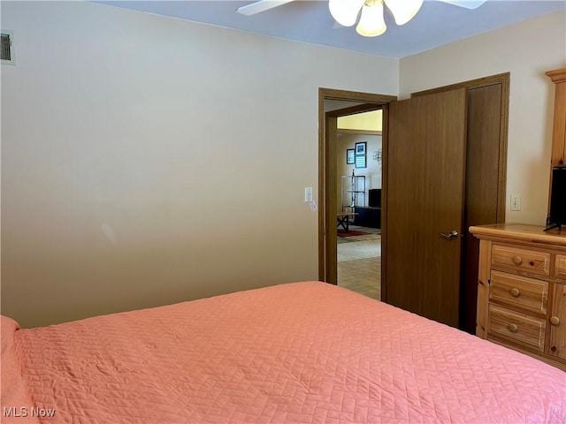 bedroom featuring a closet and ceiling fan