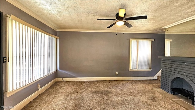 unfurnished living room with crown molding, plenty of natural light, a textured ceiling, and carpet