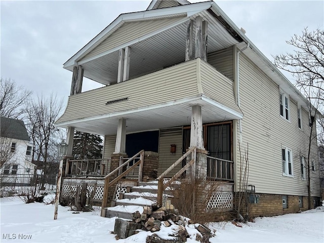 view of front of home featuring covered porch