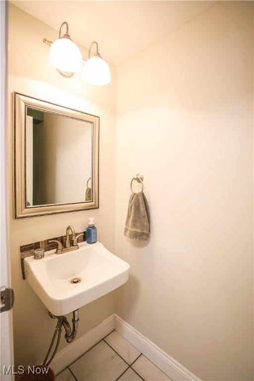 bathroom featuring sink and tile patterned floors