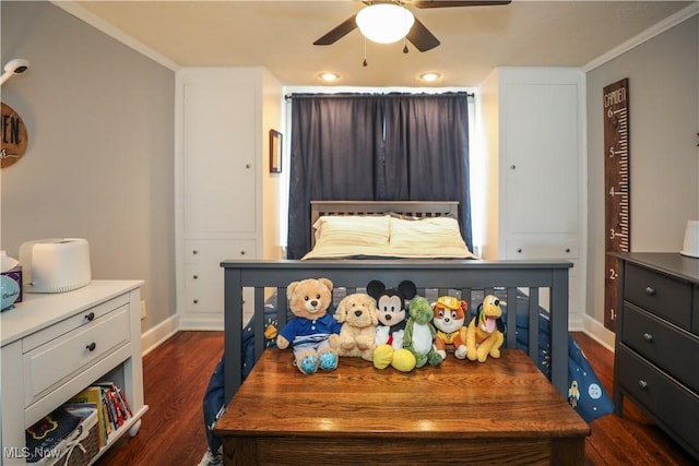 bedroom featuring crown molding, ceiling fan, and dark wood-type flooring