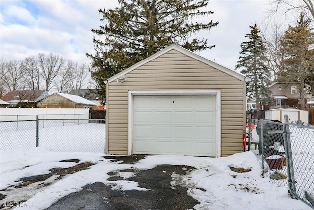 view of snow covered garage