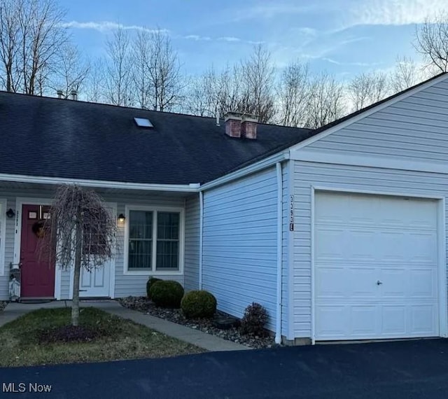 view of front of home featuring a garage