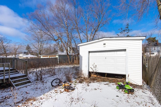 view of snow covered garage