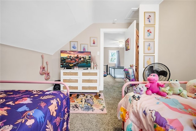 bedroom featuring lofted ceiling and carpet