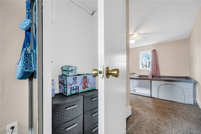 interior space featuring a ceiling fan