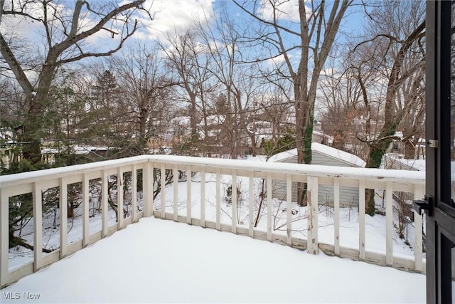 view of snow covered deck