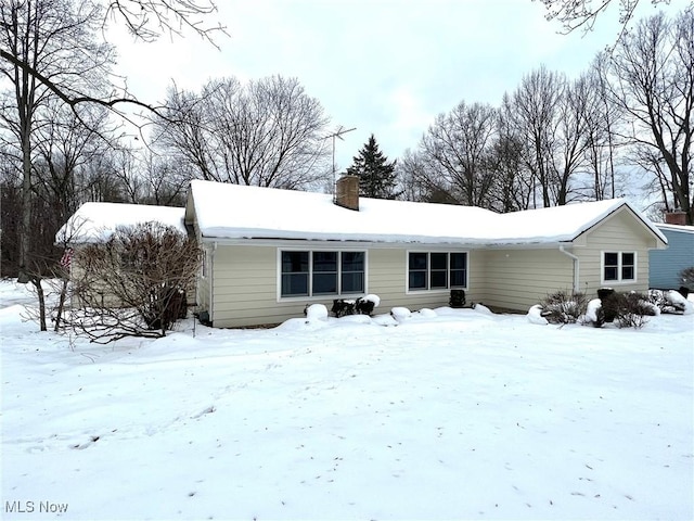 view of snow covered property