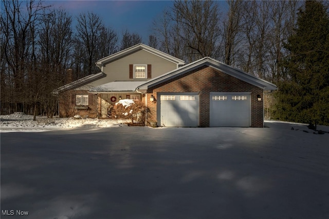 view of front of property with a garage