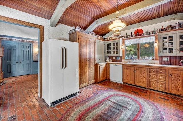 kitchen with wood ceiling, white appliances, decorative light fixtures, and sink