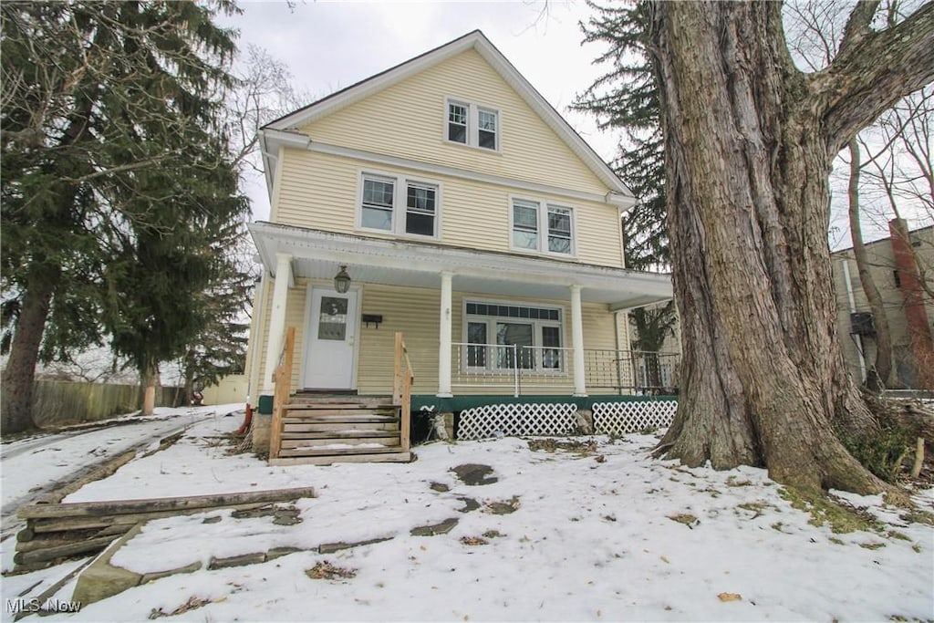 front facade featuring covered porch