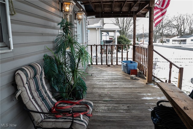 view of snow covered deck