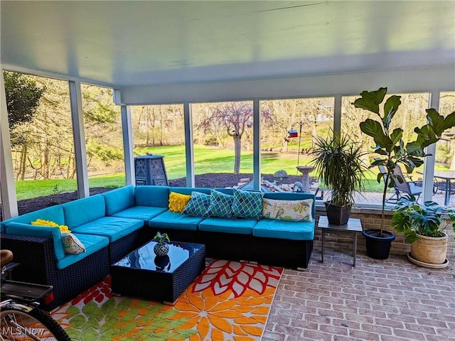 sunroom / solarium with a healthy amount of sunlight