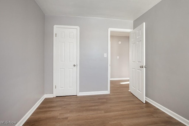 interior space with hardwood / wood-style floors