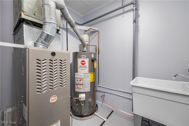 utilities featuring gas water heater and sink