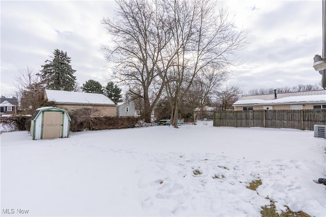 view of yard covered in snow