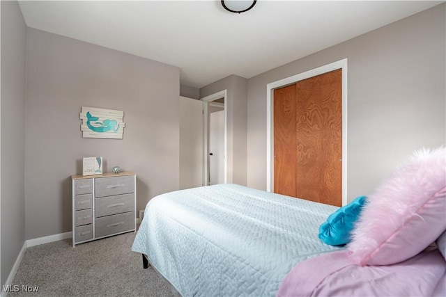 bedroom with light colored carpet