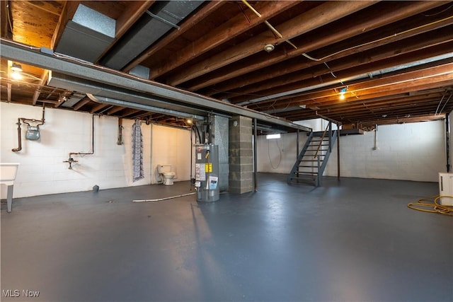 basement featuring gas water heater