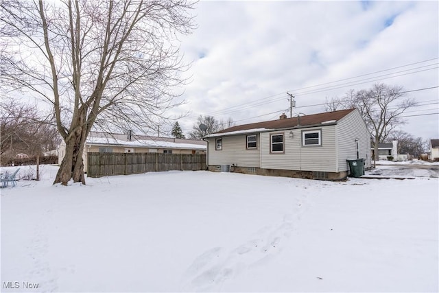 view of snow covered property