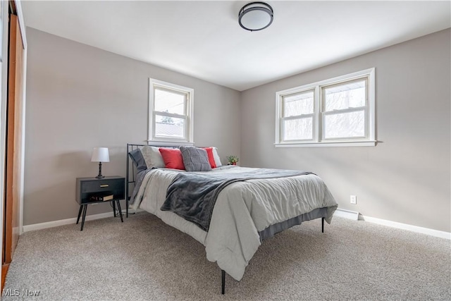 bedroom featuring carpet