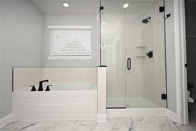 bathroom with shower with separate bathtub and toilet