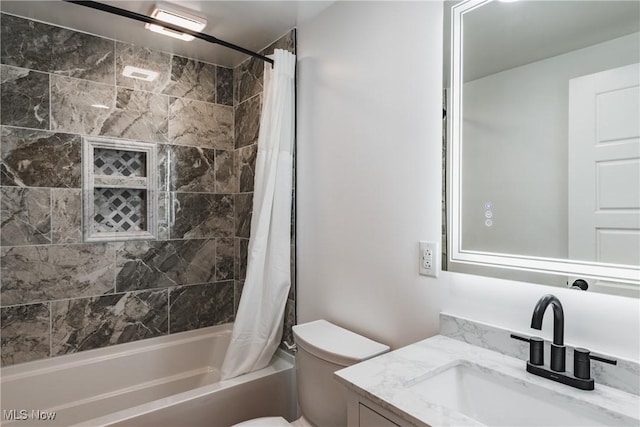 full bathroom featuring vanity, toilet, and shower / bath combo