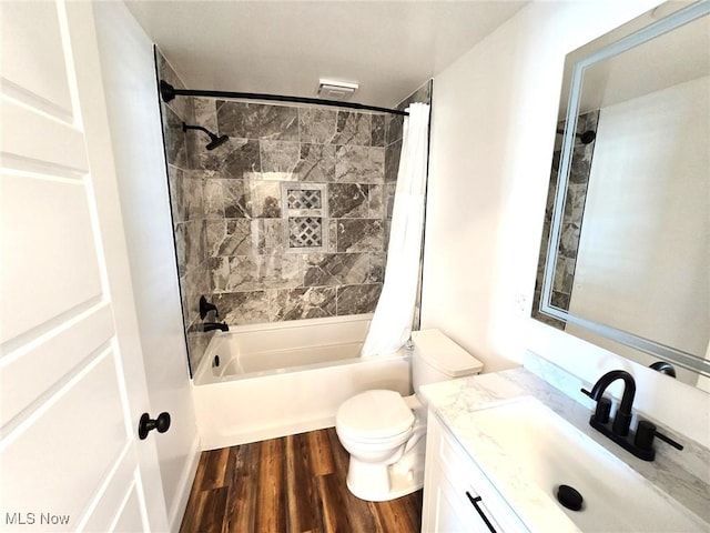 full bathroom with vanity, toilet, wood-type flooring, and shower / bath combo with shower curtain