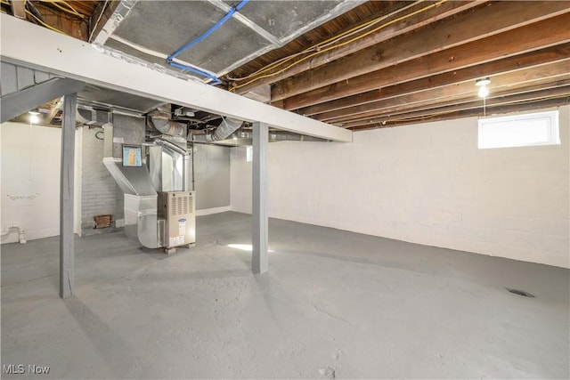 basement featuring heating unit