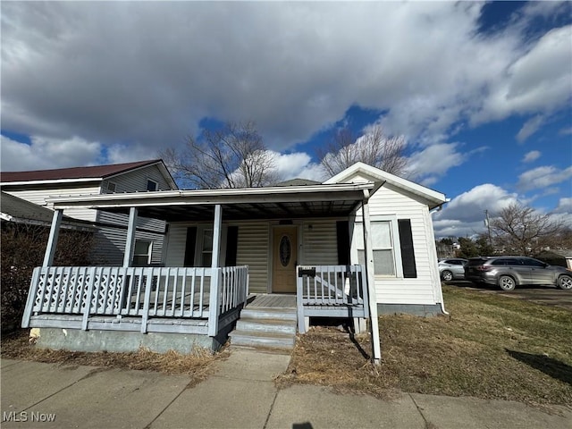 bungalow featuring a porch