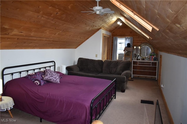 carpeted bedroom with wood ceiling, ceiling fan, lofted ceiling with skylight, and cooling unit