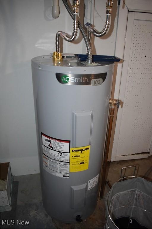 utility room with water heater