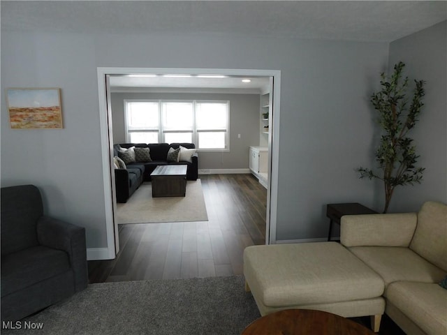 living room featuring dark hardwood / wood-style flooring