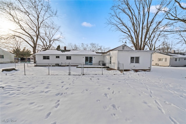 view of snow covered house